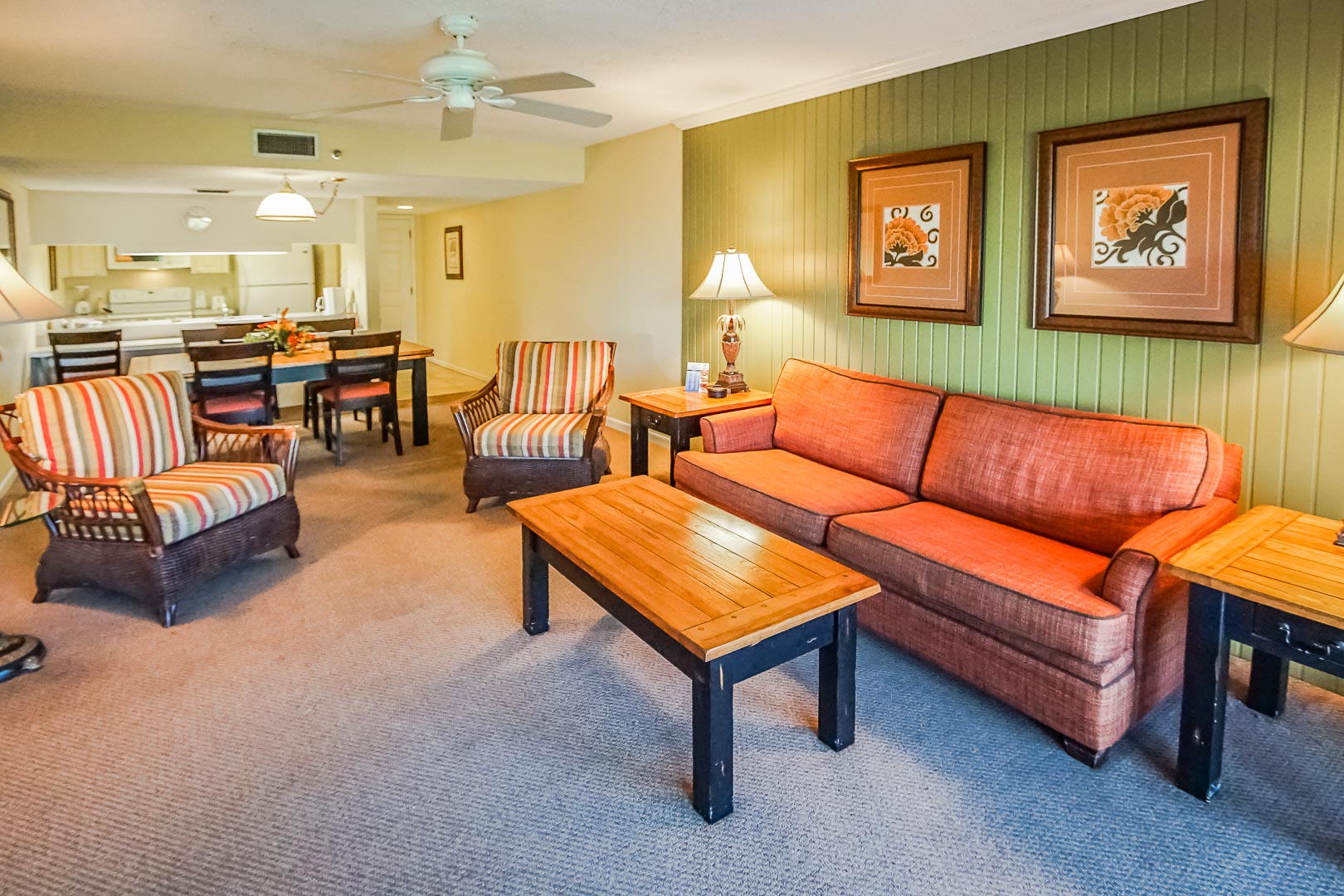 A spacious living room and dining room at VRI's Sand Pebble Resort in Treasure Island, Florida.